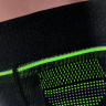BORT StabiloGen Sport mit Haftband Kniebandage, schwarz/grün, Detail Breite des Haftbandes